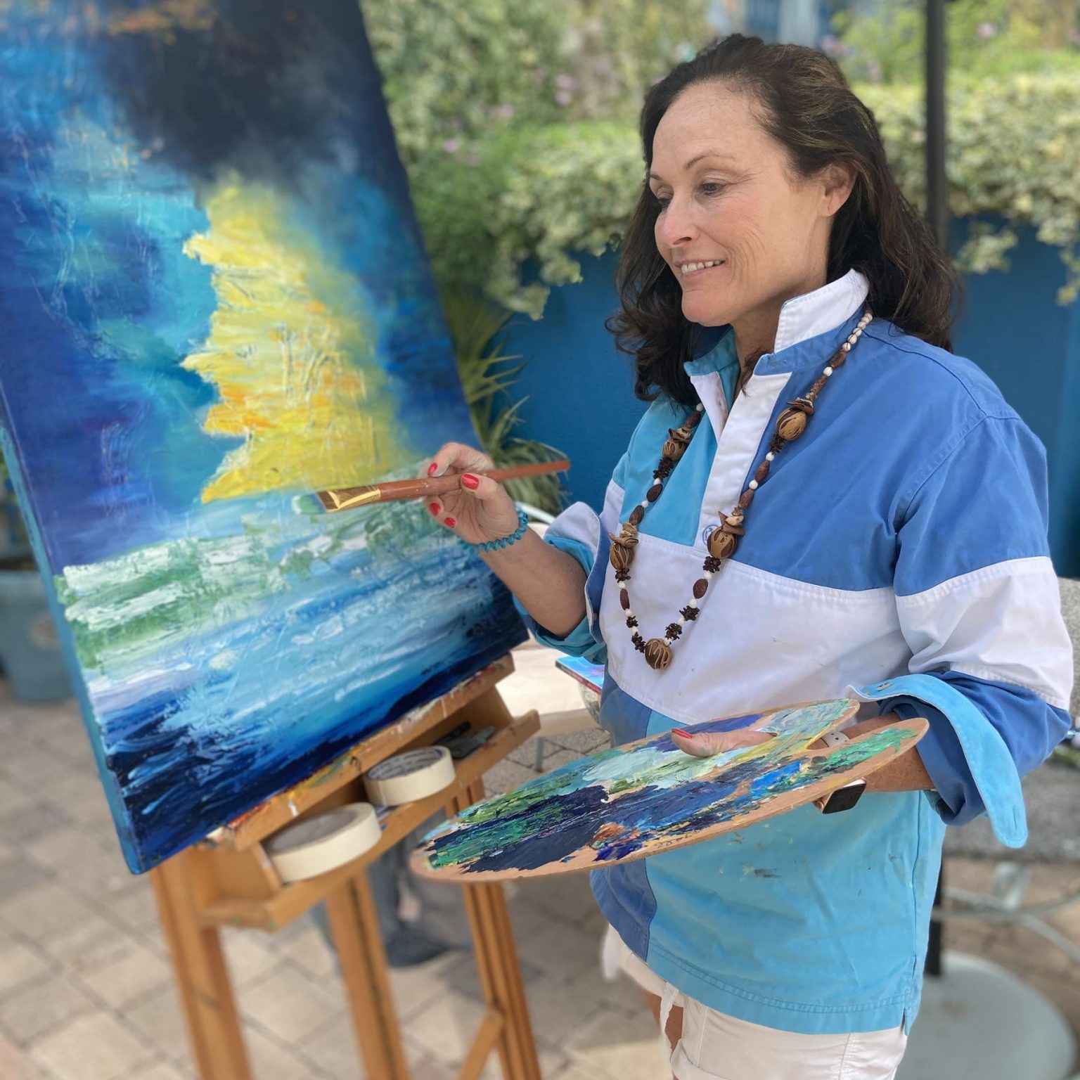 Cathy-1 Cathy Hughes painting in her back garden.